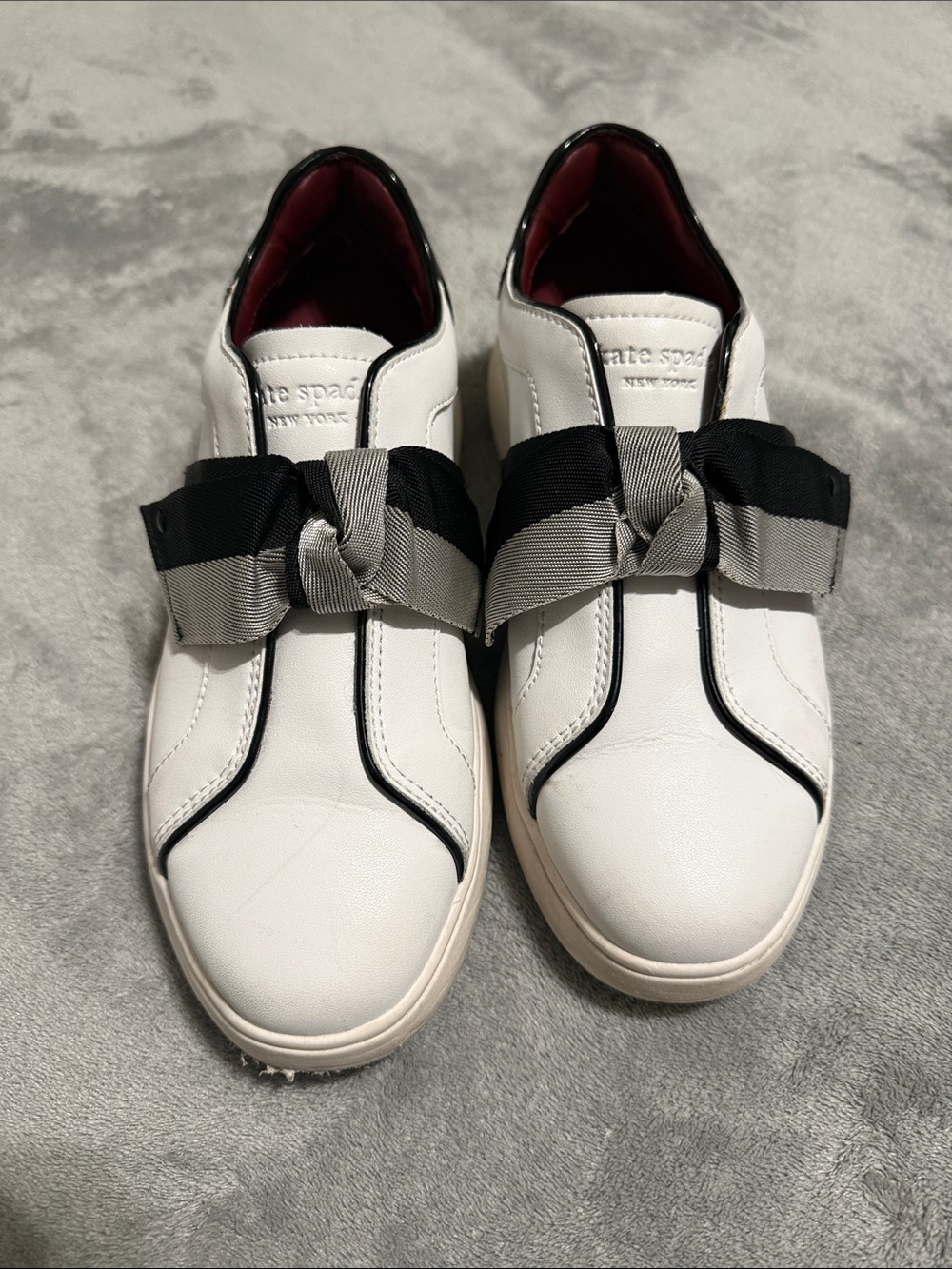 kate spade White Leather Slip-On Sneakers with Black and Gray Bow